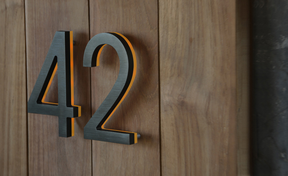 Modern Bronze House Numbers Illuminated by Luxello LED Signage